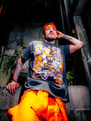 Trick or Trap T Shirt model lifestyle with orange pants - halloween design with orange and purple