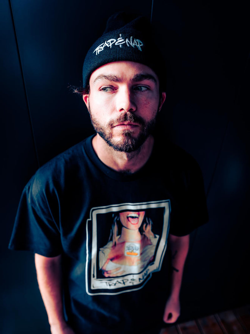 Model wearing Trap & Nap Polaroid Tee and beanie, portrait